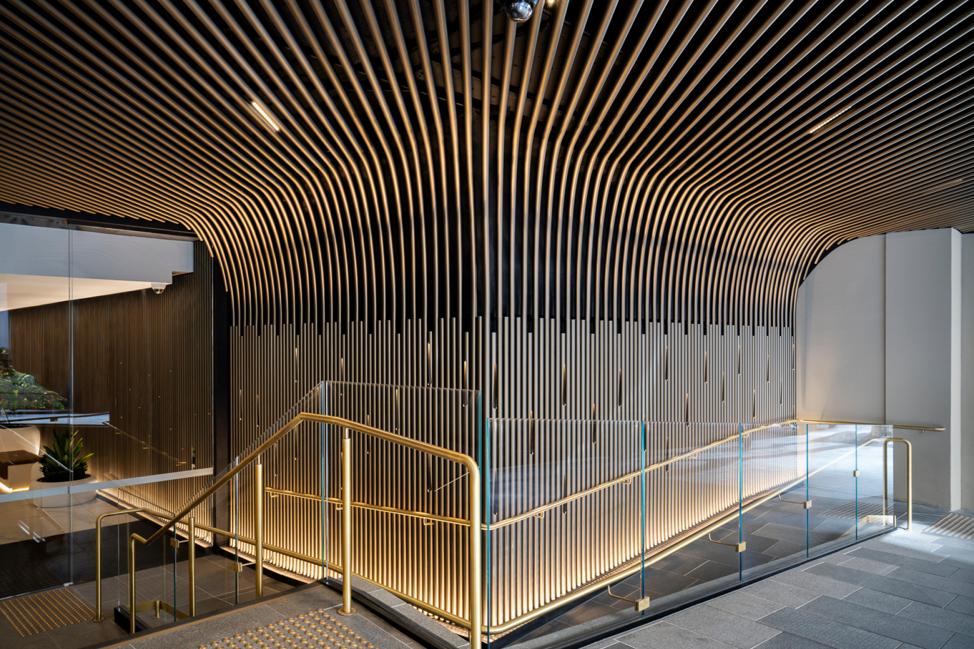10 Bond St Lobby. Enterprise Architectural Tube wall to ceiling system.
