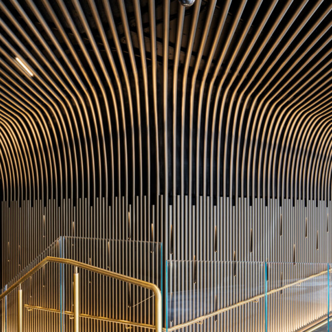 10 Bond St Lobby. Enterprise Architectural Tube wall to ceiling system.