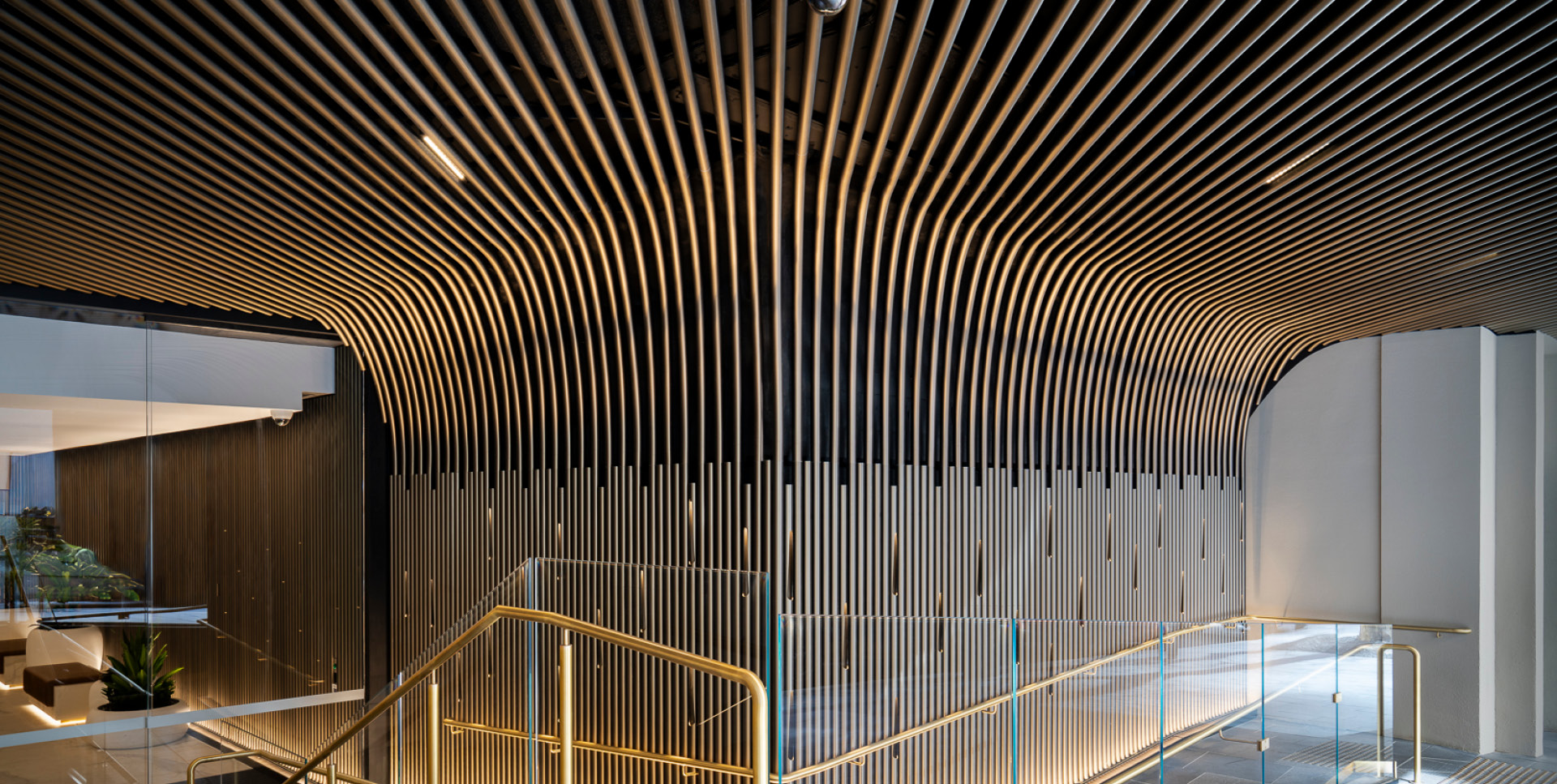 10 Bond St Lobby. Enterprise Architectural Tube wall to ceiling system.